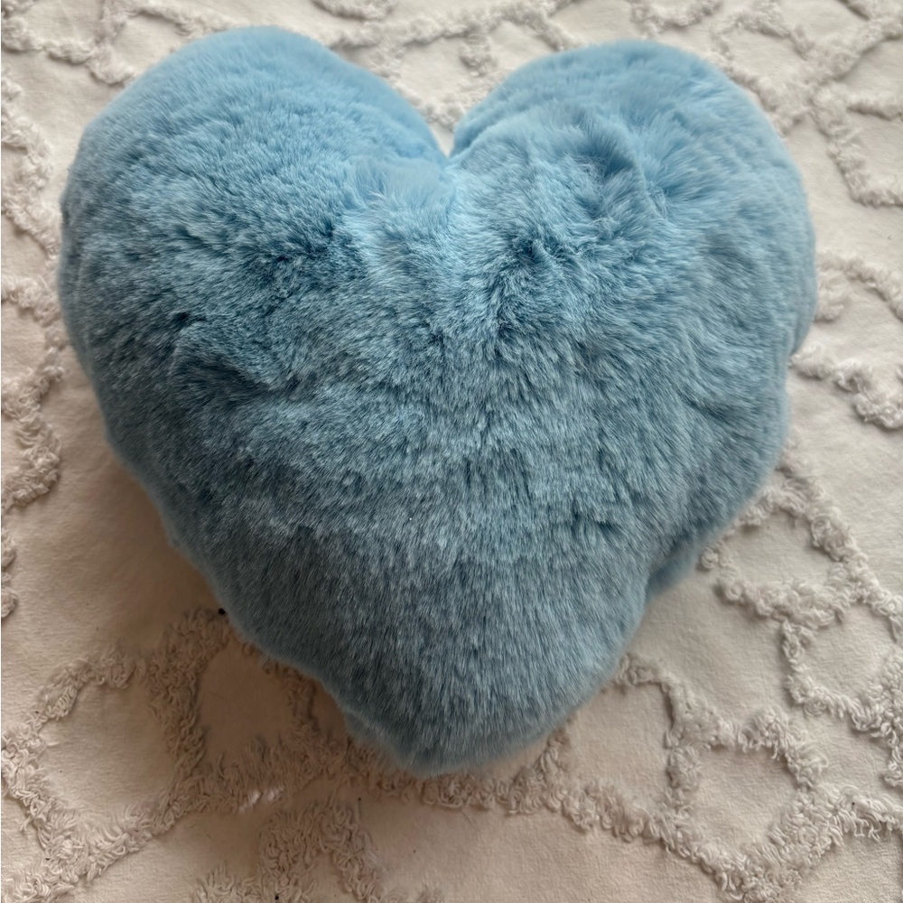 Small fluffy blue heart pillow